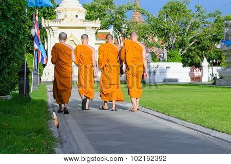 Thai Monk Walking In Temple To Worship