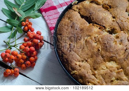 Apple pie on wooden background