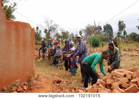 The Recovery Of The Bricks Still Good To A House Collapsed, Pomerini, Tanzania, Africa