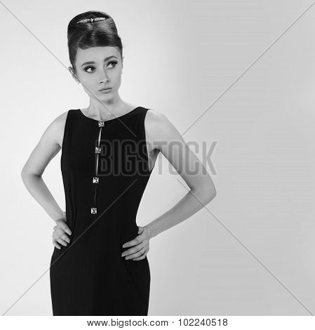 portrait of beautiful young woman in retro style . copy space.
