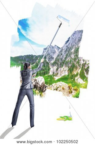 Woman painting landscape
