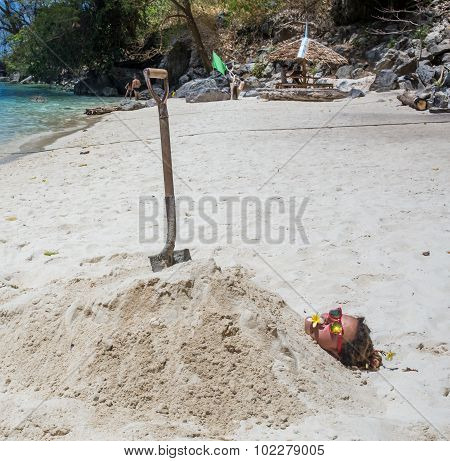 Young woman reaxing on the beach at exotic resort