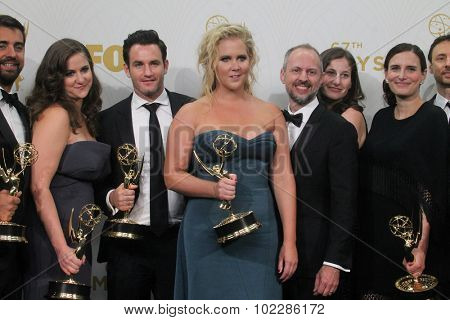 LOS ANGELES - SEP 20:  Amy Schumer at the Primetime Emmy Awards Press Room at the Microsoft Theater on September 20, 2015 in Los Angeles, CA