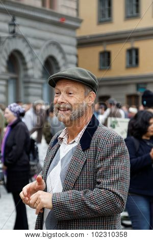 Smiling Gentleman With Beard Wearing Tweed