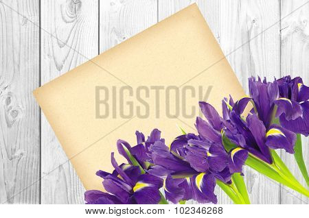Blueflag Or Iris Flower And Greeting Card On White Wooden Background
