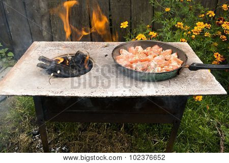 Tomatoes grilled over an open fire