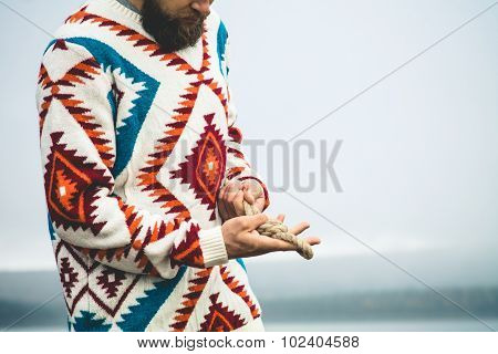 Man hands holding rope knot Travel Lifestyle survival concept