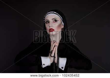 Halloween. Girl Dressed In Evil Sexy Nun