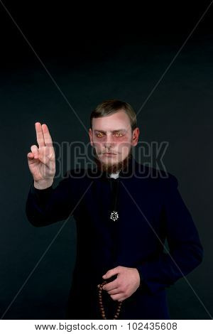 Halloween. A Man Dressed As The Evil Catholic Priest