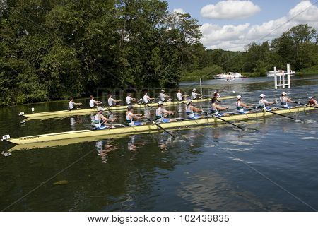 HENLEY, ENGLAND. 03-07-2010.  A.S.R. Nereus, NED (top) and  Queen's University, Belfast 'A'  (bottom) in action on day 4 of the Henley Royal Regatta 2010 held on the River Thames.  