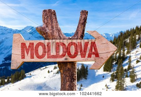 Moldova wooden sign with winter background