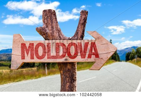 Moldova wooden sign with road background
