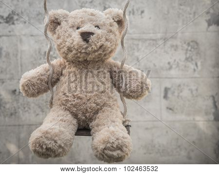 Teddybear on a swing