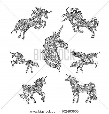 Set of black graphic unicorns.