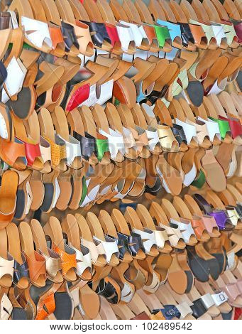 Craft Store With Many Wooden Shoes And Colored Leather