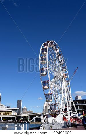 SYDNEY, AUSTRALIA - AUGUST 2015: La Estancia de Los SalaberryFerris wheel in Darling Harbour Sydney
