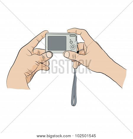 Man holding digital camera.