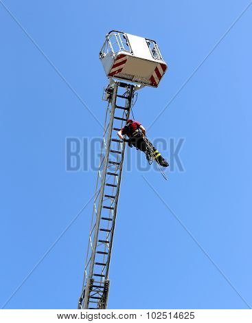 Firefighter Hung The Rope Climbing In The Firehouse