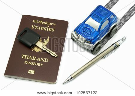 Thailand Passport, Key, Pen And Blue 4Wd Car For Travel Concept