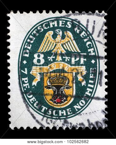 GERMAN REICH - CIRCA 1928: A stamp printed in the German Reich shows Coat of arms, Charity Stamps, circa 1928.