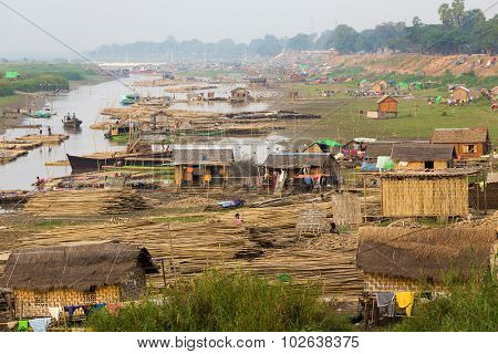 Slum village near the river in the Mandalay city in Myanmar (Burma)