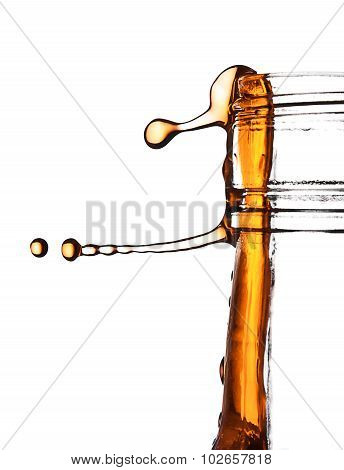 Drops of whisky on the bottle turned clockwise