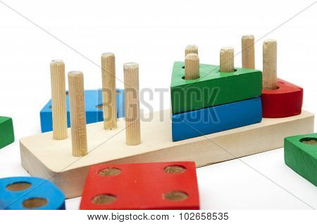 wooden different forms puzzle isolated on white