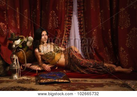 Oriental Woman In A Traditional Costume