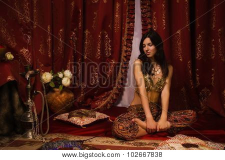 Oriental Woman In A Traditional Costume