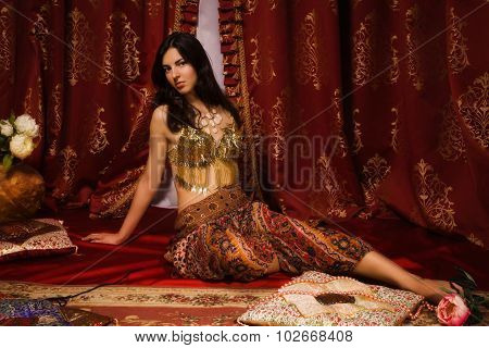 Oriental Woman In A Traditional Costume