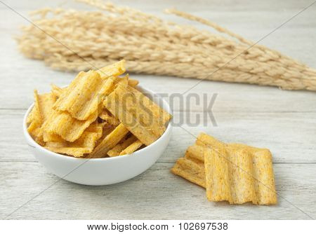multigrain in white bowl on wood table background .
