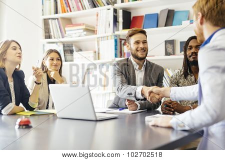 Business Shaking Hand With A Client