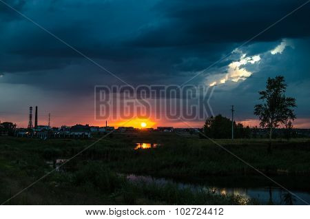 Sunset over calm lake