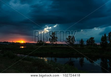 Sunset over calm lake