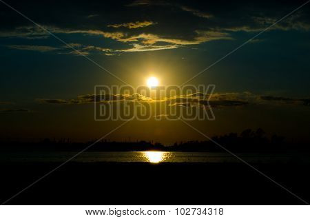 Sunset over calm lake