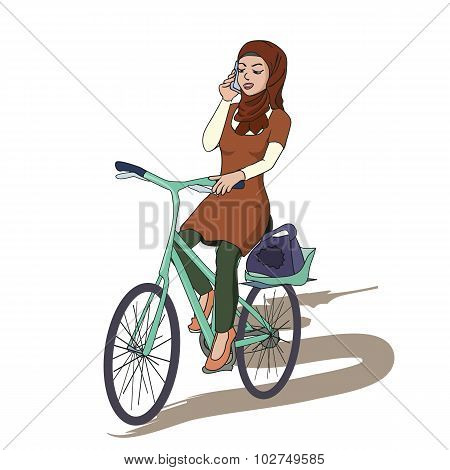 arabic girl riding bicyle while talking with smartphone