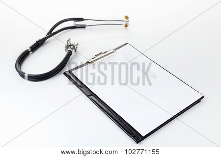 Medical Stetoscope On The Light Surface
