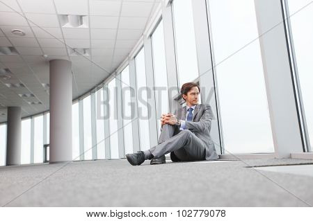 Businessman Sitting On Floor