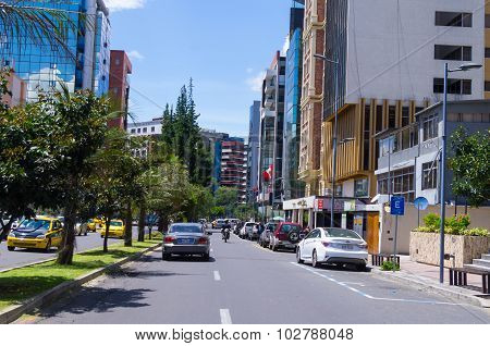 Great image from modern part of Quito mixing new architecture with charming streets and green sourro