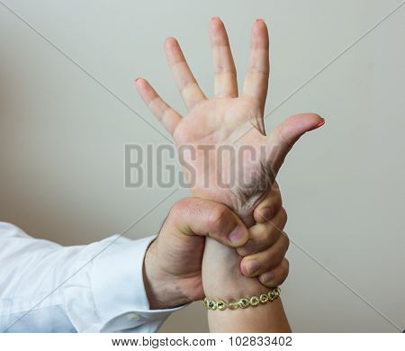 Abductor, Forcefull Man's Hand On A Female.