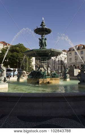 Monumental Fountain In Rossio Square In Lisbon