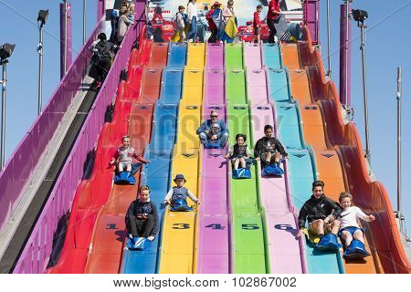 People enjoying a giant slide