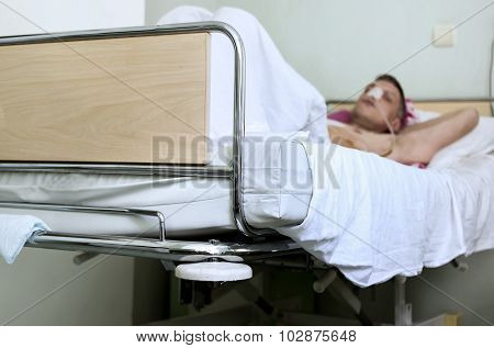 Man In Hospital Ward