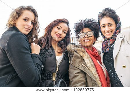 Four Young Beautiful Girls Smiling