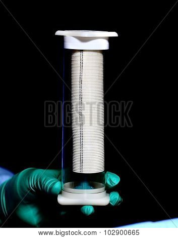 Vascular Prosthesis In A Container. Accessories For Cardiovascular Surgery
