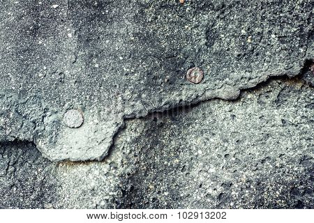 Texture of a black eternit with a nail