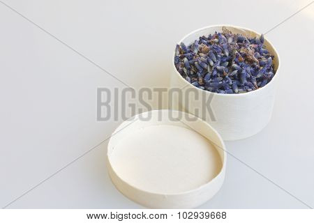 Fragrant lavender flowers gathered in a wooden box