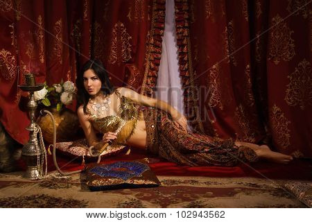 Oriental Woman In A Traditional Costume
