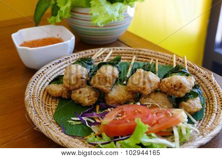 Grilled Pork Wrapping With Wildbetal Leafbush