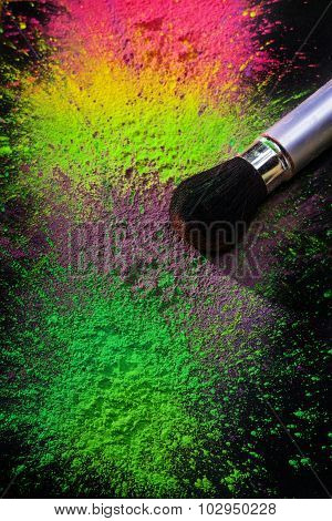Makeup brush with holi paint